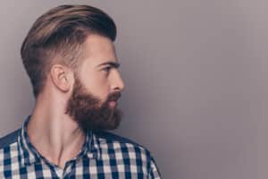 Side,View,Portrait,Of,Thinking,Stylish,Young,Man,Looking,Away