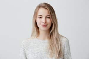 Woman with full hair after hair loss treatment in Washington, DC